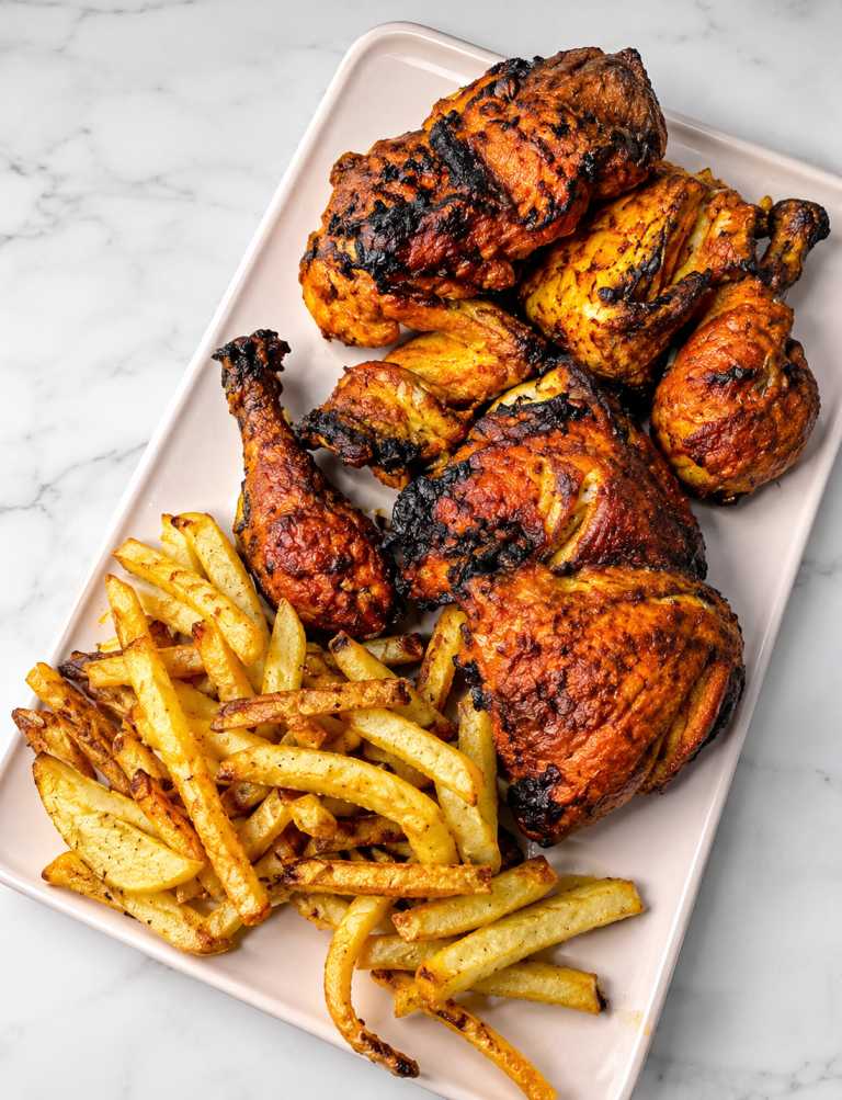 bbq chicken on charcoal grill